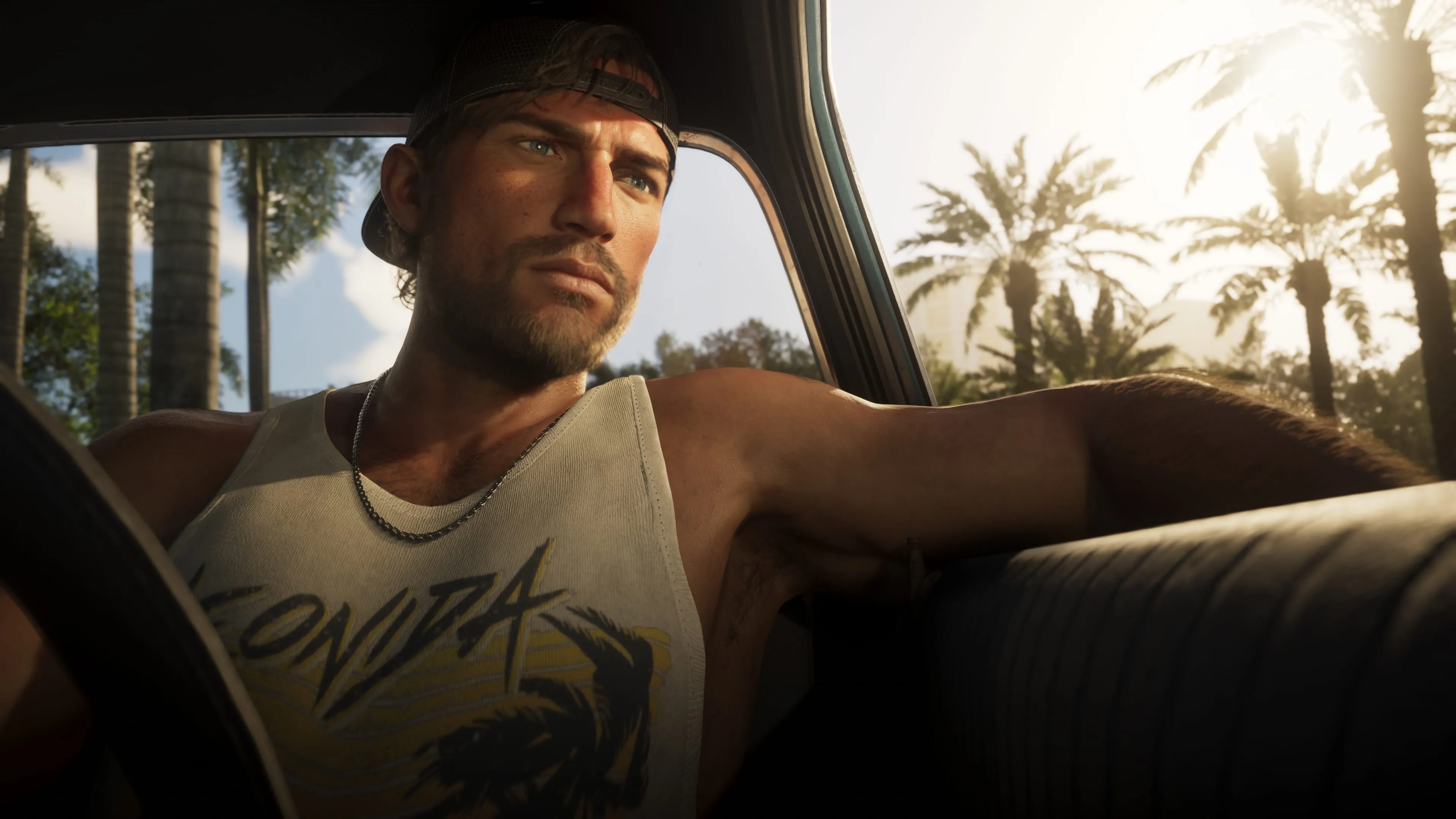 GTA 6 — a man in a backwards cap relaxes in a convertible in Leonida