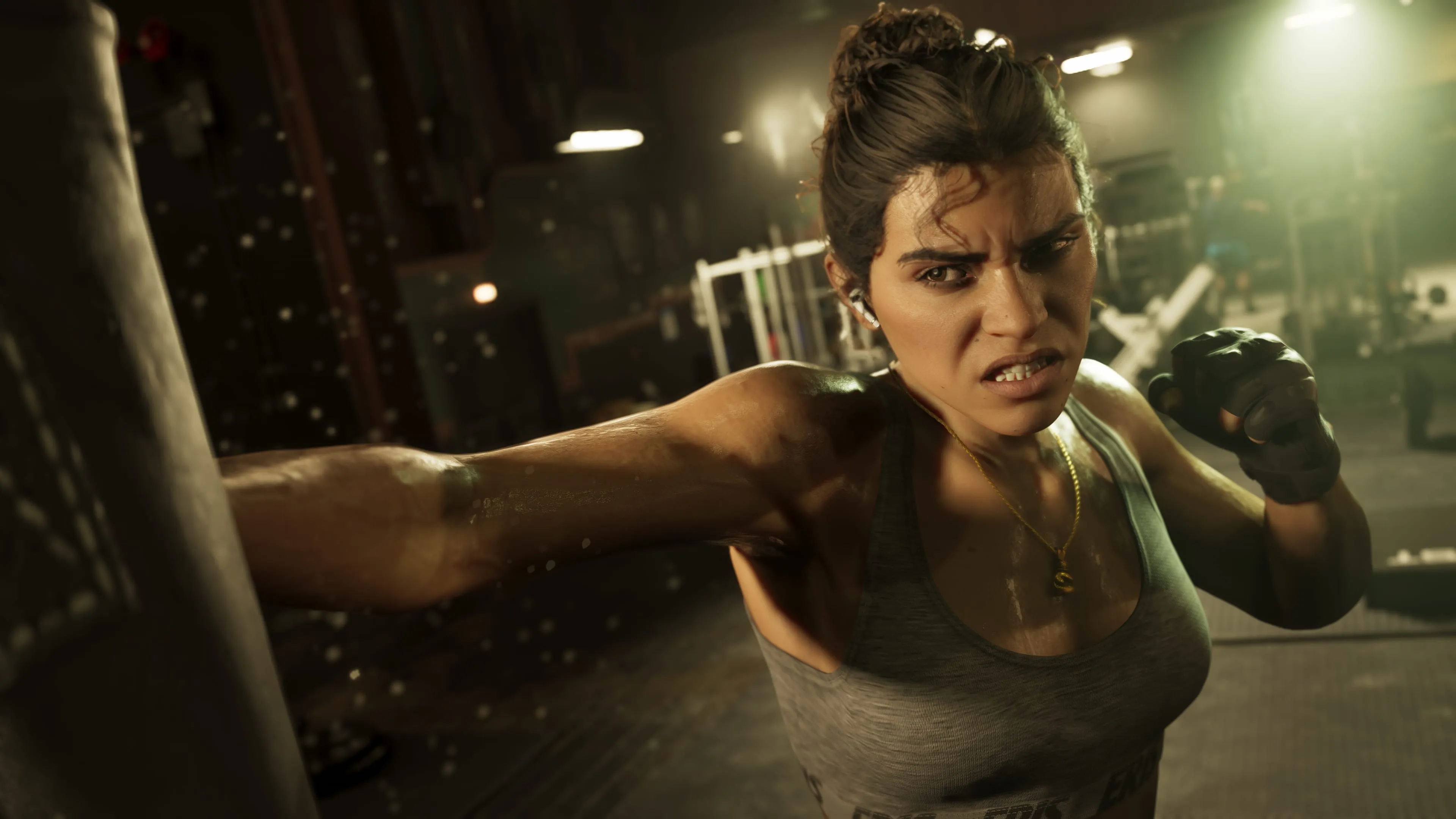 GTA 6 Lucia Caminos training on a heavy bag in a boxing gym
