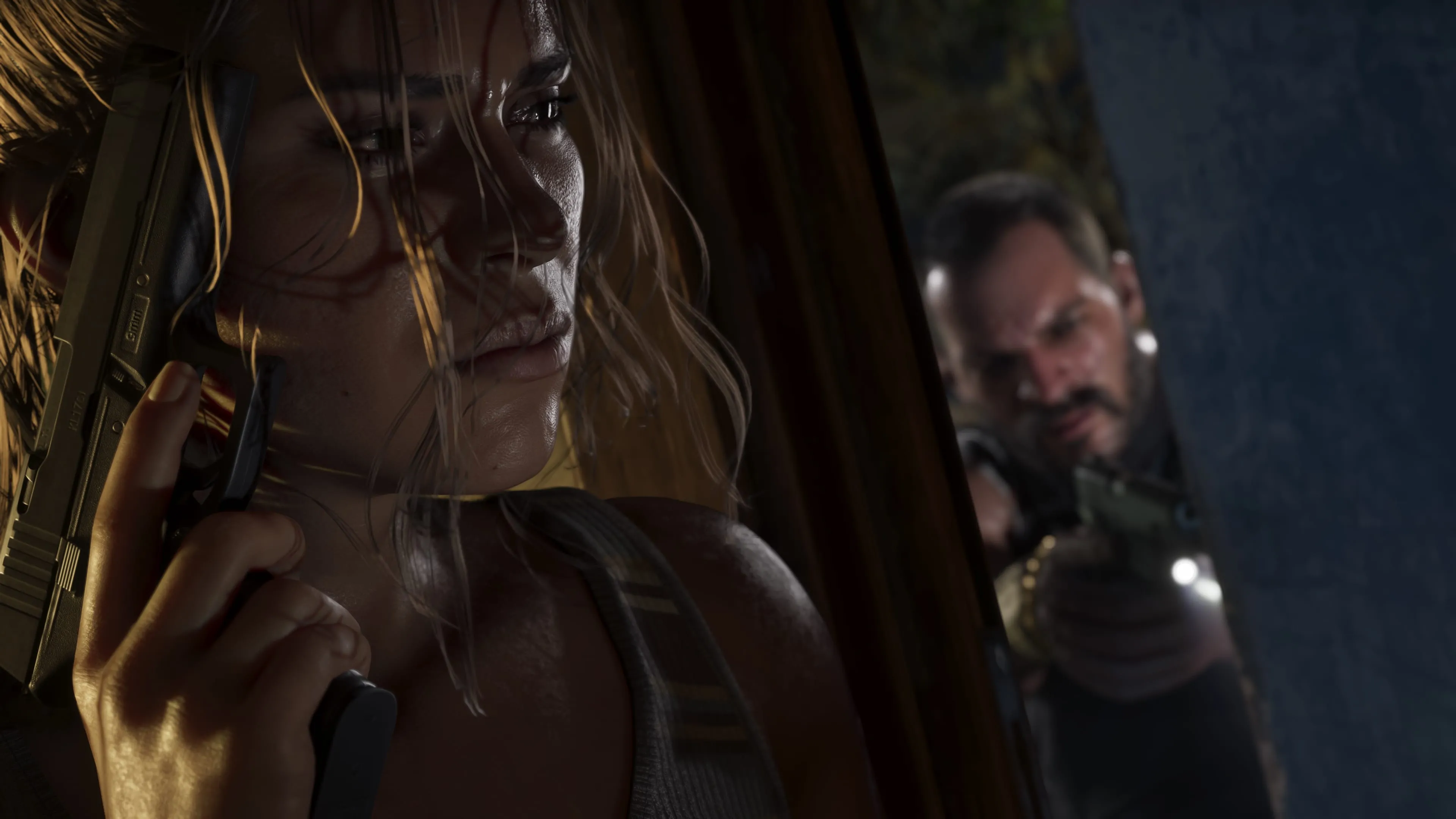 GTA 6 tense night scene — Lucia gripping a pistol as an armed man approaches